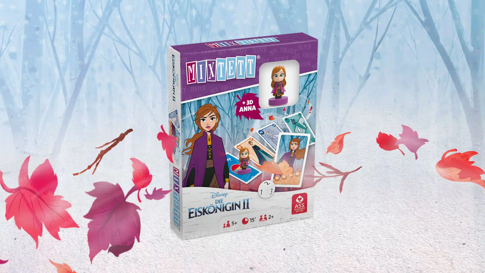 Das Disney Die Eiskoenigin 2 Mixtett Anna Spiel steht auf einem verschneitem Untergrund. Im Hintergrund ist ein verschneiter Wald zu erkennen, um das Spiel herum fliegen ein paar bunte Laubblätter im Wind.