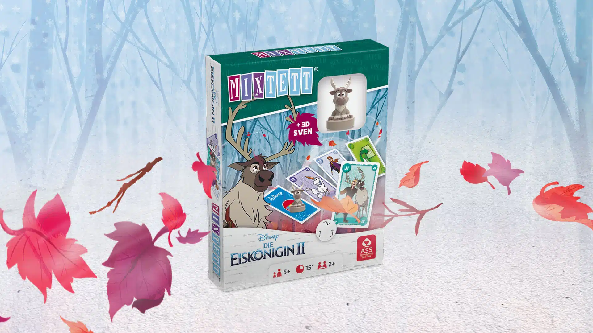 Das Disney Die Eiskoenigin 2 Mixtett Sven Spiel steht auf einem verschneitem Untergrund. Im Hintergrund ist ein verschneiter Wald zu erkennen, um das Spiel herum fliegen ein paar bunte Laubblätter im Wind.